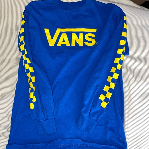 blue and yellow long sleeve shirt
